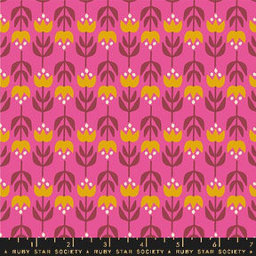 a pink and yellow flower pattern on a pink background
