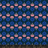 a blue and pink flower pattern on a black background