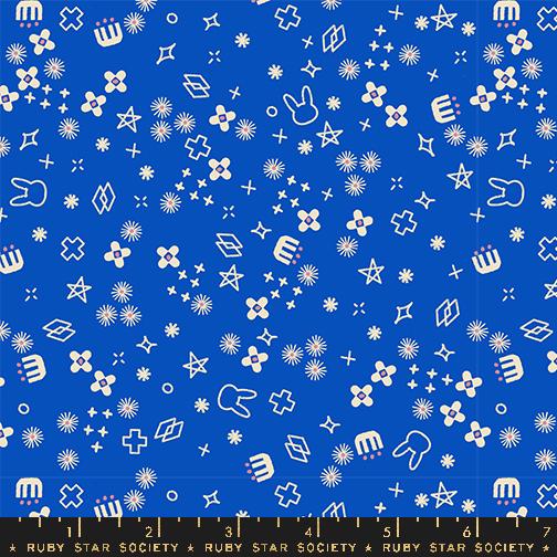 a blue background with white stars and symbols