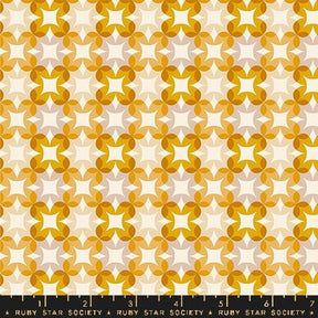a yellow and white pattern with stars on it