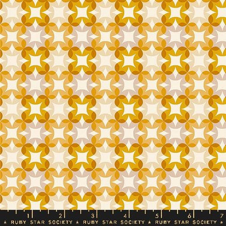 a yellow and white pattern with stars on it