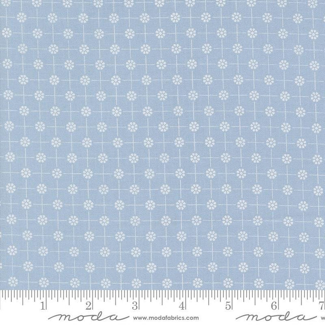 a ruler with a blue and white pattern on it