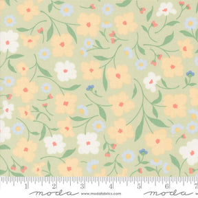 a green and yellow floral print fabric