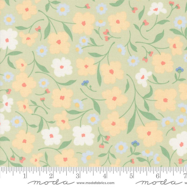 a green and yellow floral print fabric