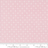 a pink background with white flowers on it