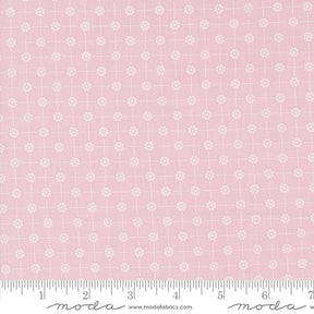 a pink background with white flowers on it