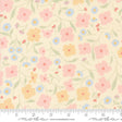 a flowered fabric with a ruler in front of it