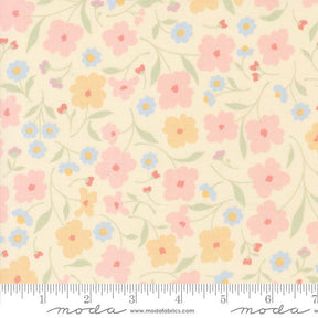 a flowered fabric with a ruler in front of it