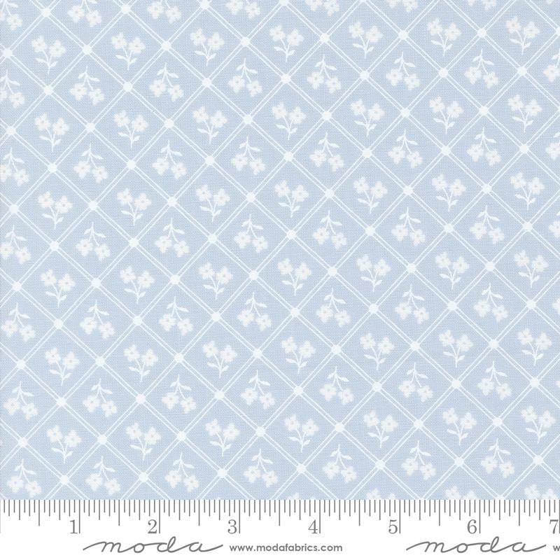 a ruler with a blue and white pattern on it