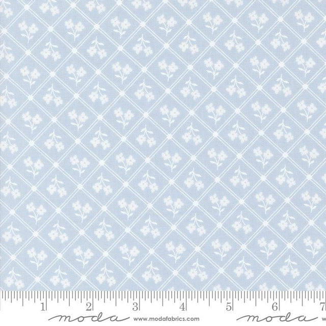 a ruler with a blue and white pattern on it