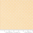 a ruler with a yellow background with white flowers