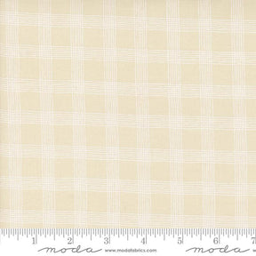 a ruler with a white checkered pattern on it
