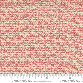 a ruler with a red and white fabric