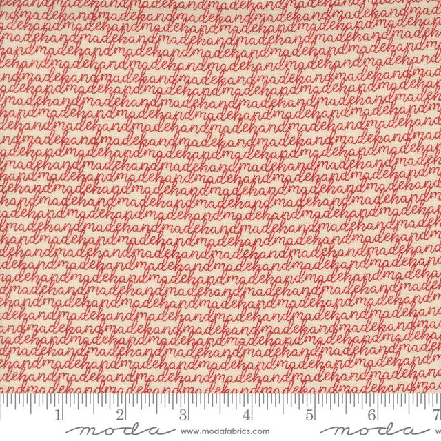 a ruler with a red and white fabric