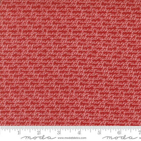 a red fabric with white letters on it