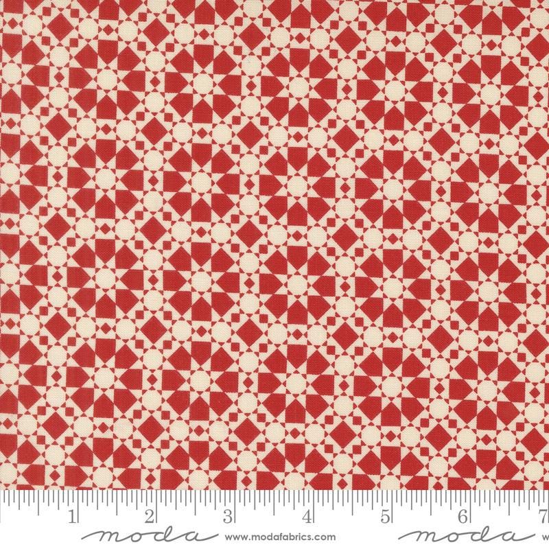a red and white pattern with circles on it