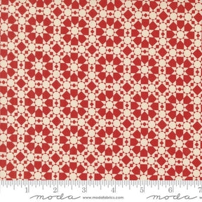a red and white pattern with circles on it