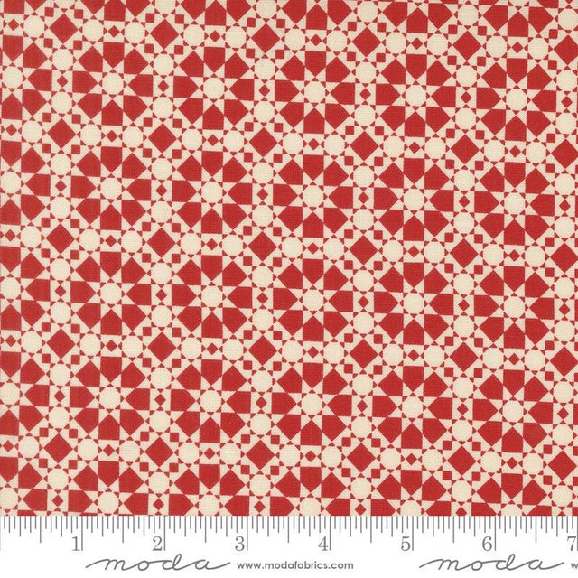 a red and white pattern with circles on it
