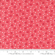 a red fabric with white flowers on it
