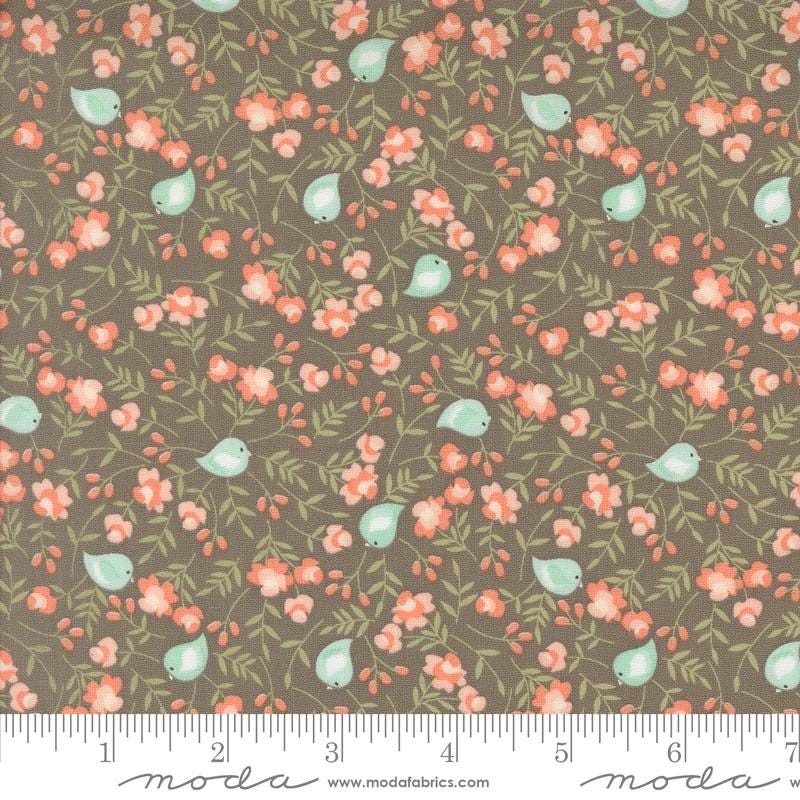 a brown background with pink flowers and birds