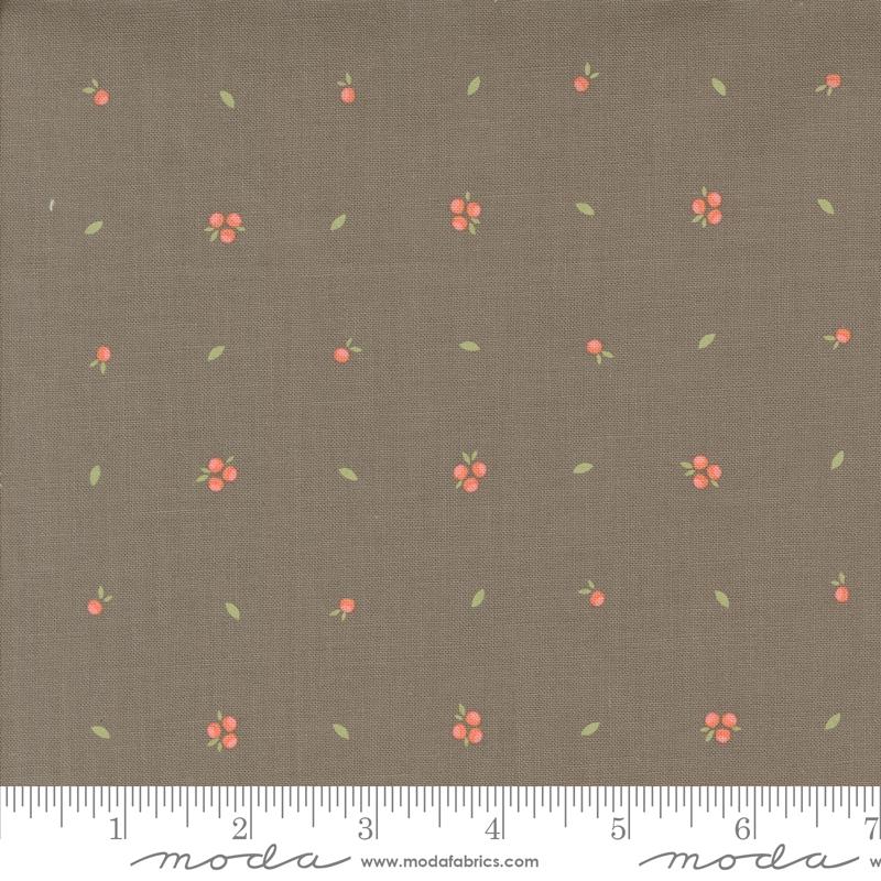a brown background with pink flowers and green leaves