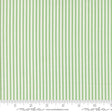 a ruler with a green and white striped fabric