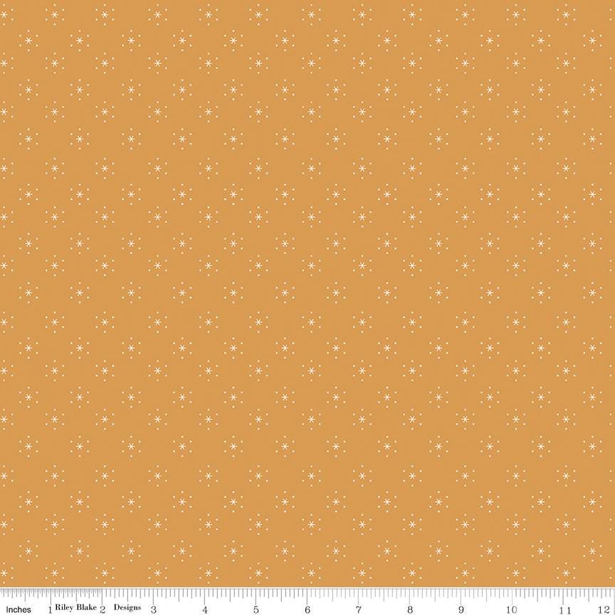a yellow background with white dots on it