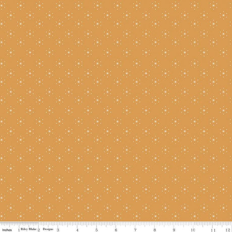 a yellow background with white dots on it
