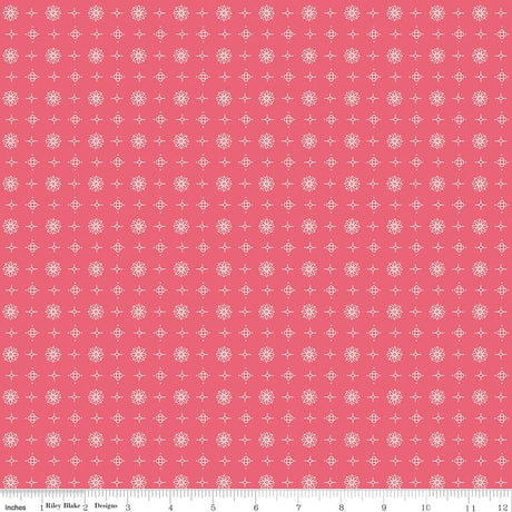 a pink background with white dots