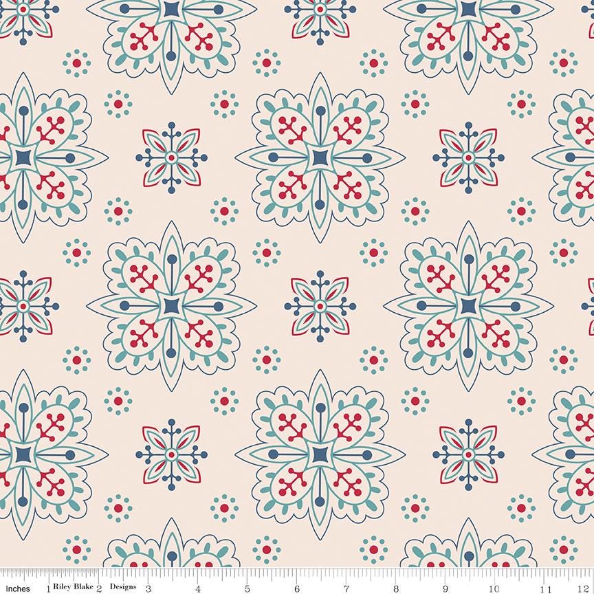 a blue and red flower pattern on a pink background