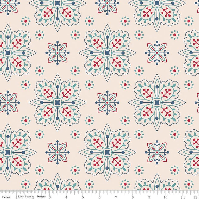 a blue and red flower pattern on a pink background