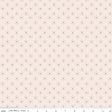 a ruler is next to a wall with a pattern on it