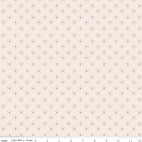 a ruler is next to a wall with a pattern on it