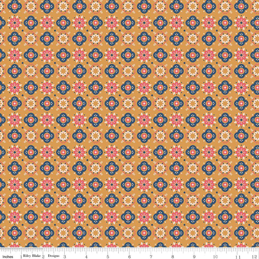 an orange background with blue and pink flowers