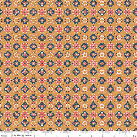 an orange background with blue and pink flowers