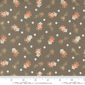 a brown background with flowers and polka dots