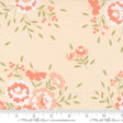 a flowered fabric with a ruler in front of it
