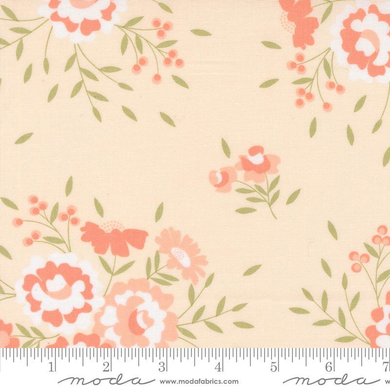 a flowered fabric with a ruler in front of it