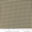 a black and white checkered fabric with a ruler