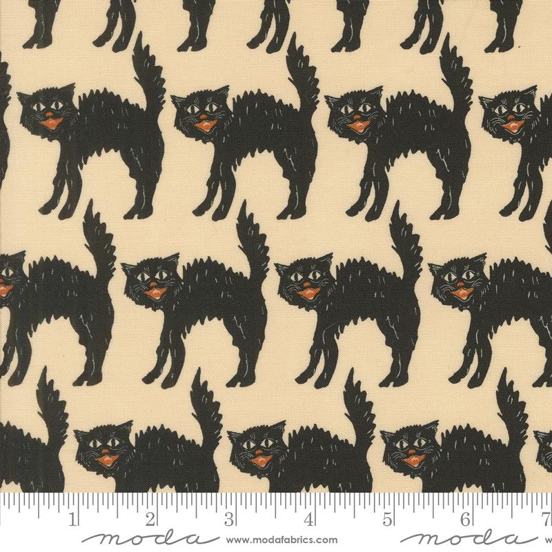 a black cat pattern on a cream background