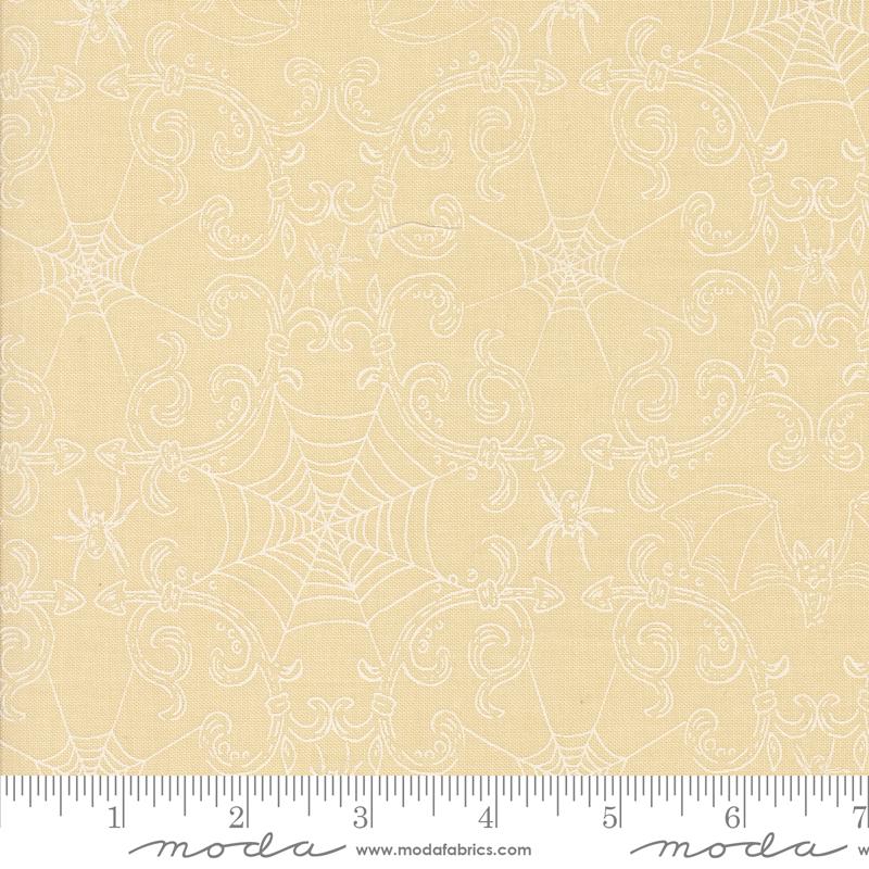 a yellow background with a spider web pattern