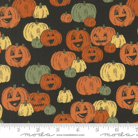 a black background with orange and green pumpkins