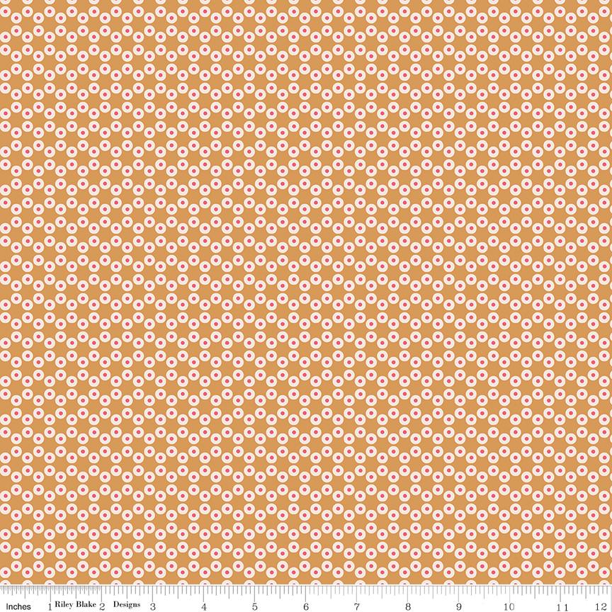 an orange and white background with a flower pattern
