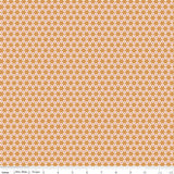 an orange and white background with a flower pattern