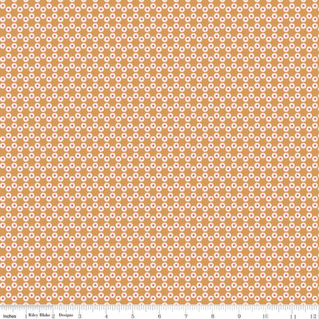 an orange and white background with a flower pattern