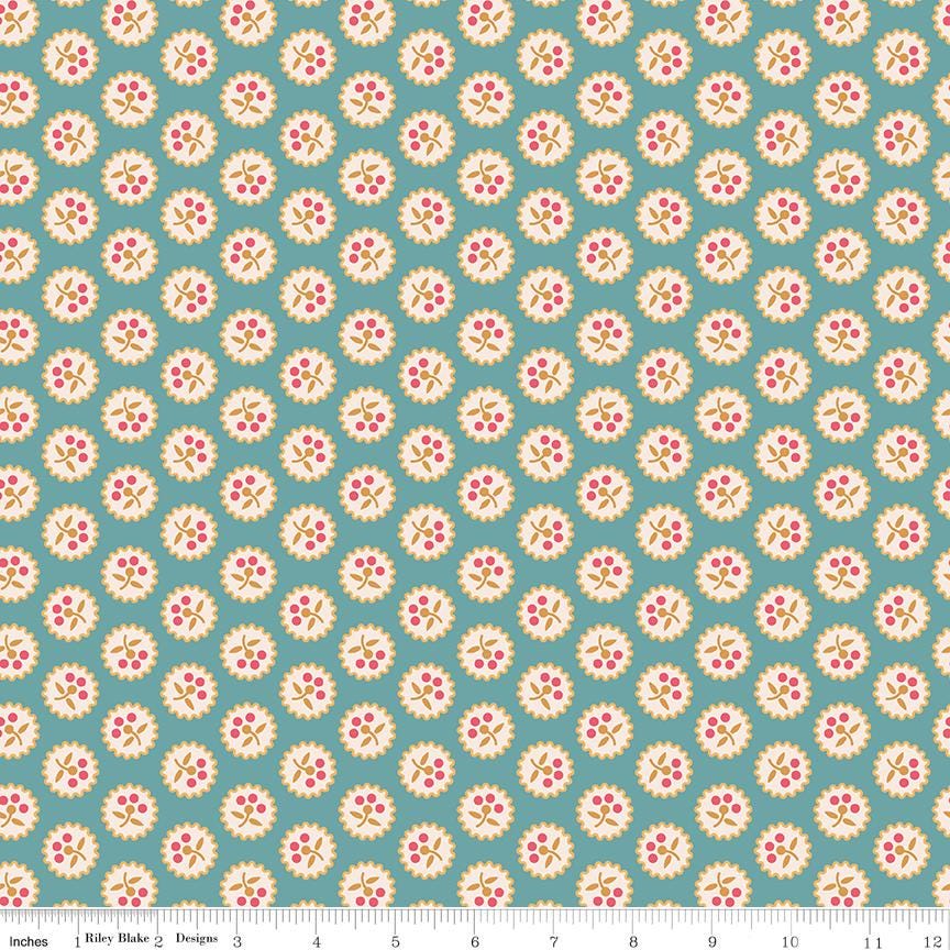 a blue and white background with a flower pattern