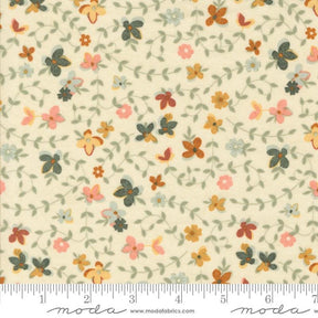 The image is a fabric with a floral pattern, featuring various shades of green, orange, and pink flowers and leaves. The fabric appears to be a light-colored material, possibly cream or pale yellow, with a repeating pattern of flowers and leaves. The image does not contain any text or specific details about the objects or their arrangement.