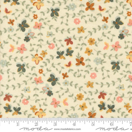 The image is a fabric with a floral pattern, featuring various shades of green, orange, and pink flowers and leaves. The fabric appears to be a light-colored material, possibly cream or pale yellow, with a repeating pattern of flowers and leaves. The image does not contain any text or specific details about the objects or their arrangement.