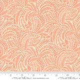 a repeating pattern of orange leaves and branches on a light beige background.