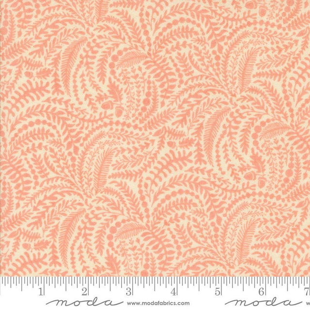 a repeating pattern of orange leaves and branches on a light beige background.